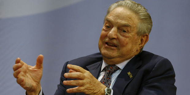 Soros: Putin hryzie ako pes zahnan� do k�ta, kr�za je pr�le�itos� pre Merkelov�