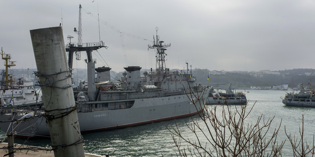 Merkelov�: E� je pripraven� potresta� Rusko ekonomick�mi sankciami